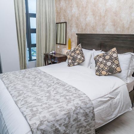 Petronella Suites Apartment @ Jesselton Quay Кота-Кінабалу Екстер'єр фото